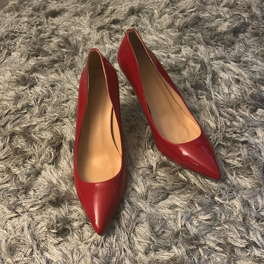 Size 45 pointed toe red heels, size 12 mens size 15 womens